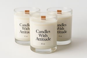 a bundle of (3) 12 oz wooden wick candles with white cream in color wax and :Candles With Attitude on the label